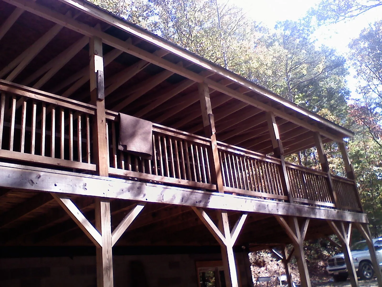 Timber framing under a new elevated porch and deck — Roof Leak Repair in Haslett by Roofing Brothers